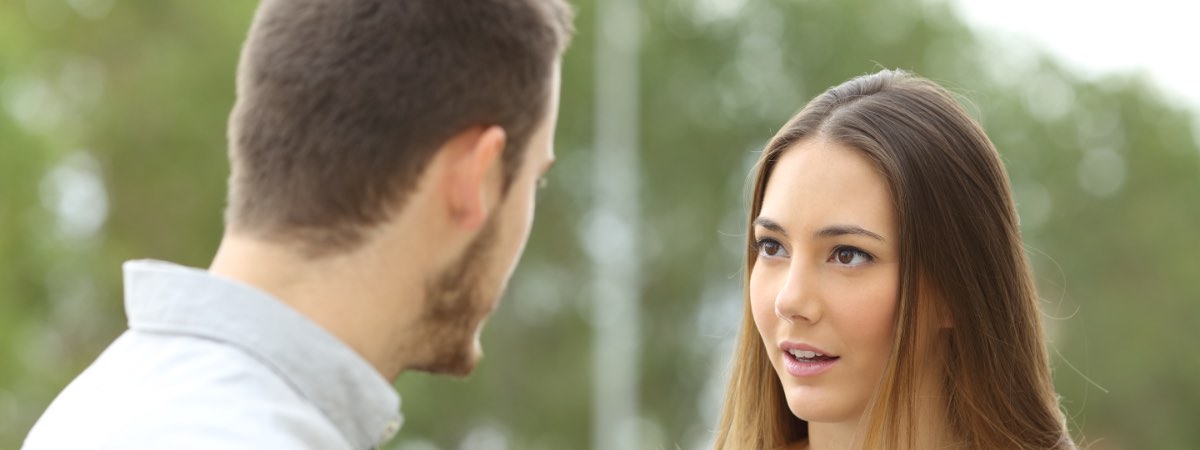 man and woman talking